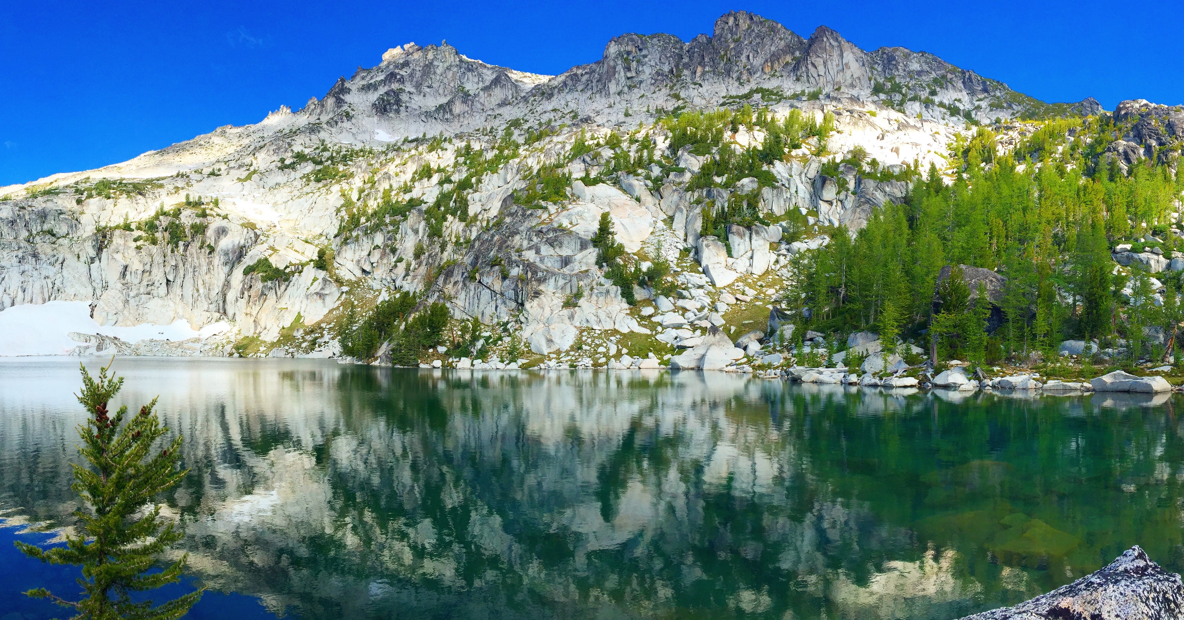 Mountain landscape with a lake and clear blue sky